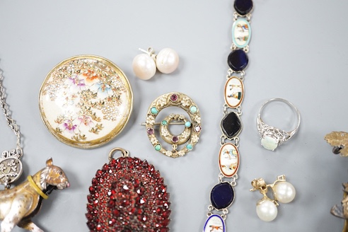Mixed jewellery including enamelled white metal bracelet, garnet paste set brooch, pair of gilt white metal and gem set drop earrings, etc.